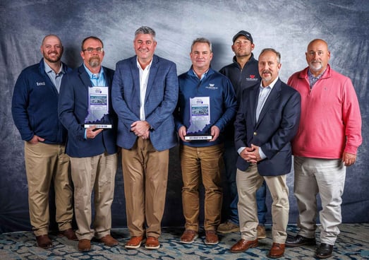 Group photo of Irving Materials project team receiving the 2025 IRMCA Project of the Year Award at the IRMCA Winter Mixer.